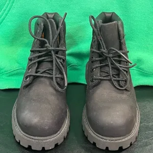 All black Timberland Boots