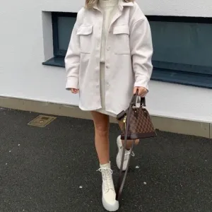 All white heeled boots