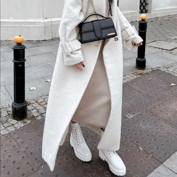 All white heeled boots
