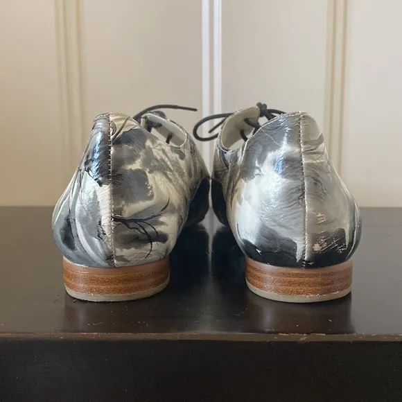 ANTHROPOLOGIE BILLY ELLA black and white lace up pointy toe loafers.