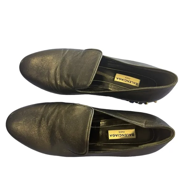 Balenciaga black loafers featuring almond toe, leather insole.