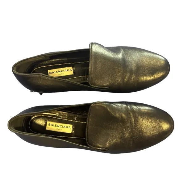 Balenciaga black loafers featuring almond toe, leather insole.