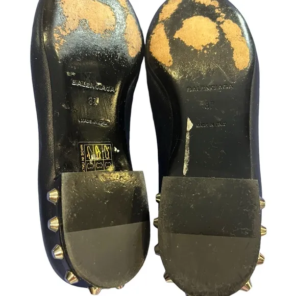 Balenciaga black loafers featuring almond toe, leather insole.