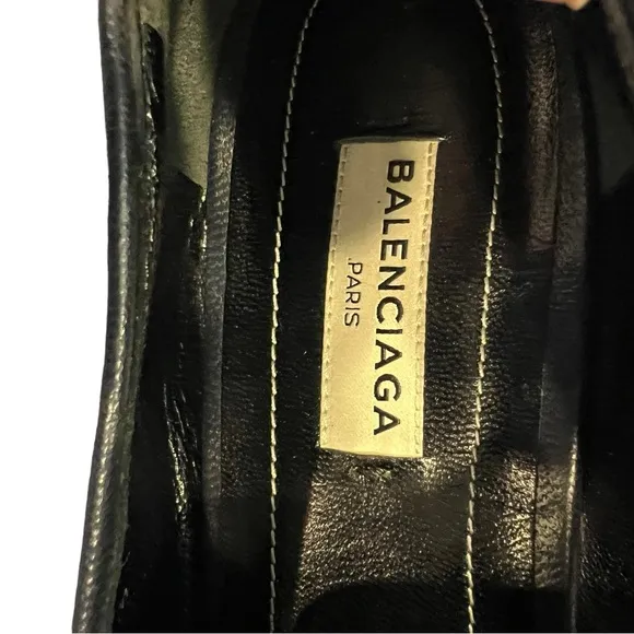 Balenciaga black loafers featuring almond toe, leather insole.