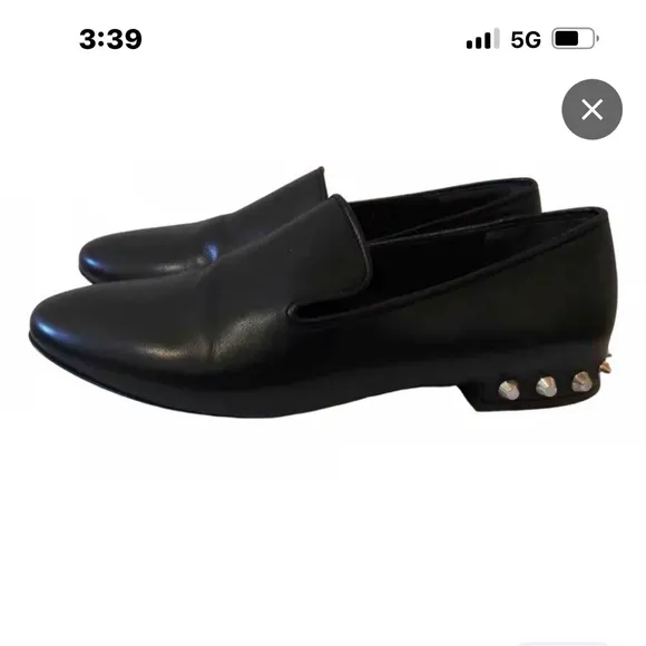 Balenciaga black loafers featuring almond toe, leather insole.