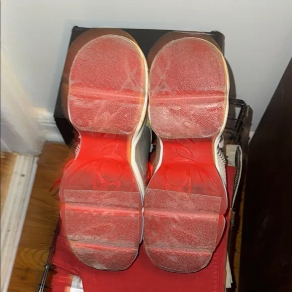 Christian Louboutin Red Sole Sneakers with Bold Design