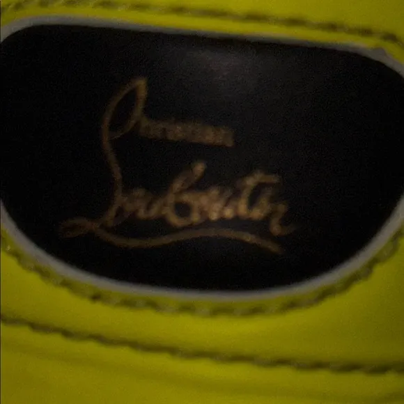 Christian Louboutin Red Sole Sneakers with Bold Design