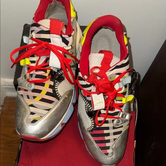 Christian Louboutin Red Sole Sneakers with Bold Design