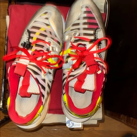Christian Louboutin Red Sole Sneakers with Bold Design
