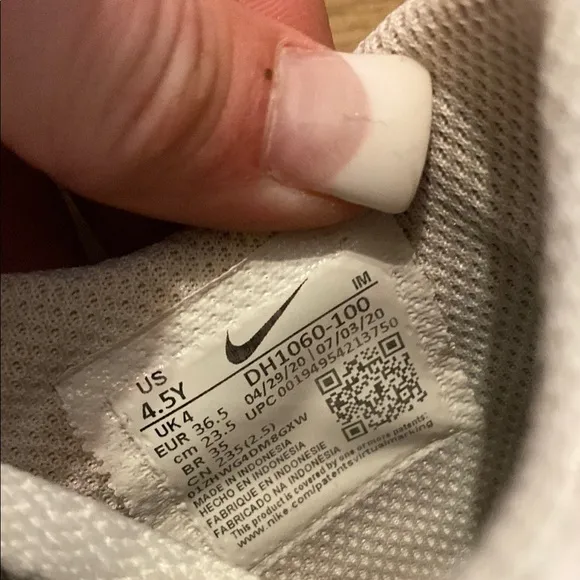 Classic White Nike Sneakers with Brown Sole