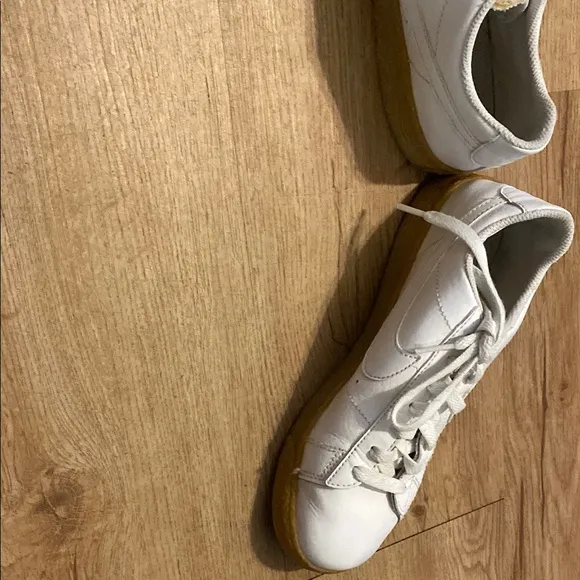 Classic White Nike Sneakers with Brown Sole