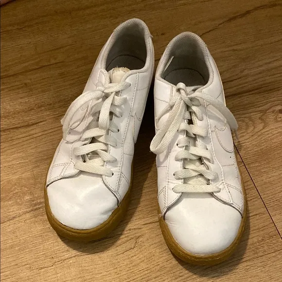 Classic White Nike Sneakers with Brown Sole
