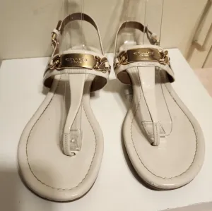 Coach Caterine Cream Patent Leather Gold Metal Logo T-Strap Sandals Sz.7 Ret$165
