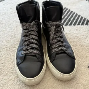 Common Projects Black and White High-Top Sneakers
