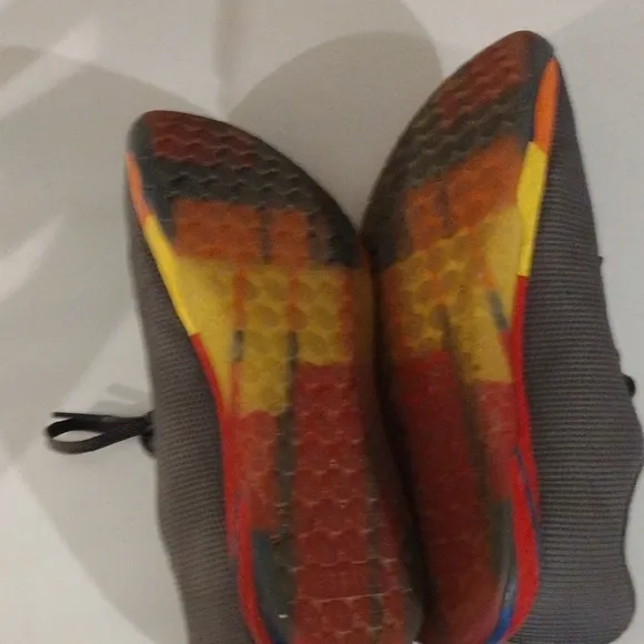 Gray and Yellow Sneakers with Vibrant Sole
