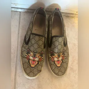 Gucci Dublin Slip-On Sneaker cat design shoes gucci logo flats lion loafers