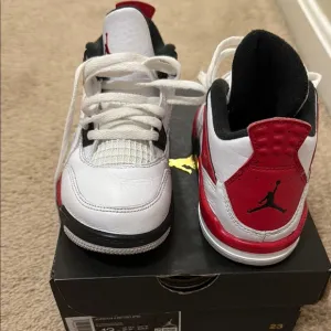 Jordan White and Red Basketball Sneakers with Supportive Sole
