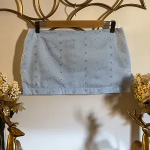 Lola’s Digicam Blue Eyelet Skirt – Timeless Summer Luxury