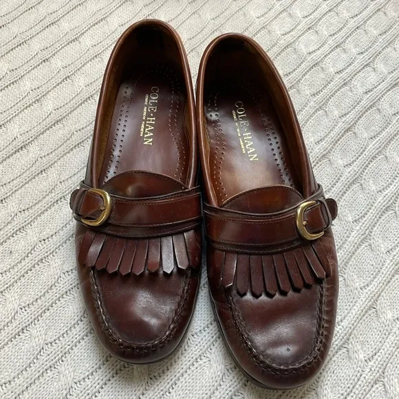 Men’s Cole Haan loafers. Sz 11D. Leather. Fringe buckle. Handsewn Good condition