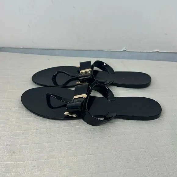 Michael Kors Kayden Jelly Bow Tie Thong Sandals in Black. Size 10.