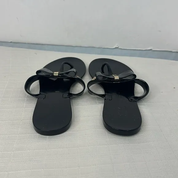 Michael Kors Kayden Jelly Bow Tie Thong Sandals in Black. Size 10.