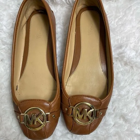 Michael Kors Fulton leather tan slip on flats with gold tone logo accent SZ7.5M