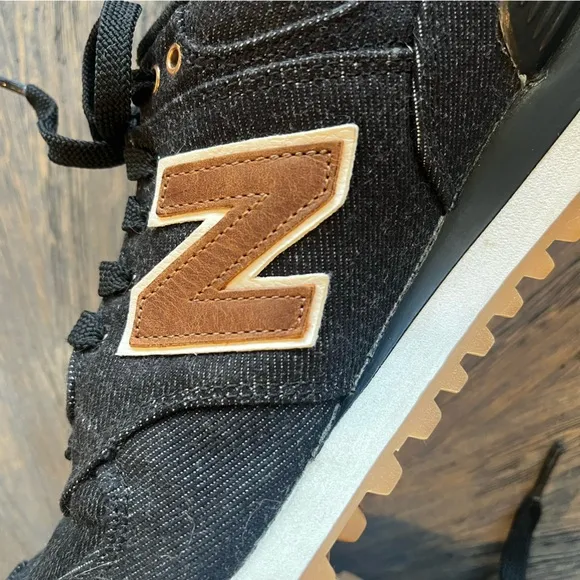 New Balance 574 Black Denim and Tan Leather Sneakers. Size Woman’s 7.5.