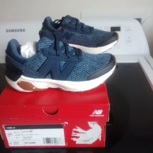 New Balance Blue Sneakers with Sleek Design and White Sole