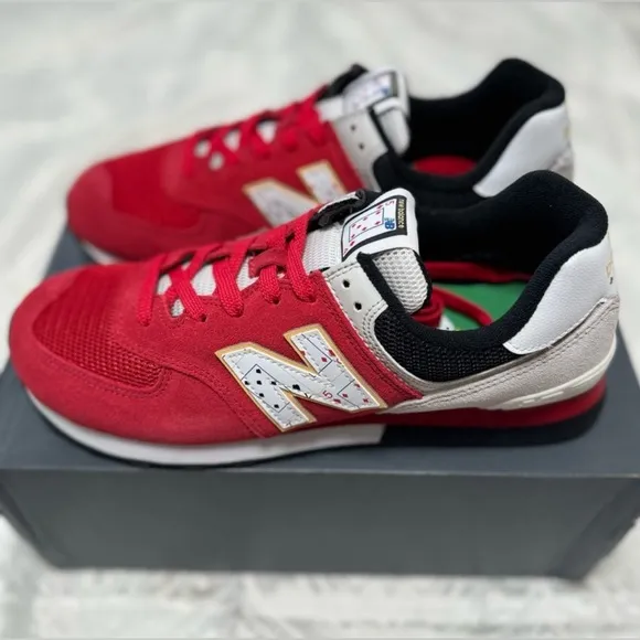 New Balance Retro Red and Gray Sneakers with Bold Design