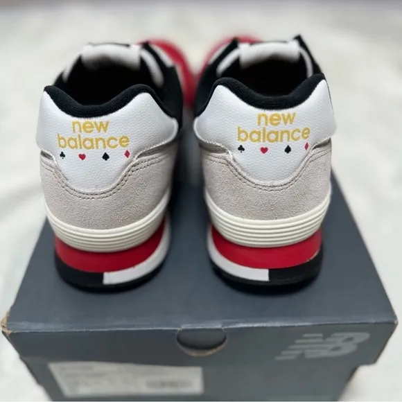 New Balance Retro Red and Gray Sneakers with Bold Design