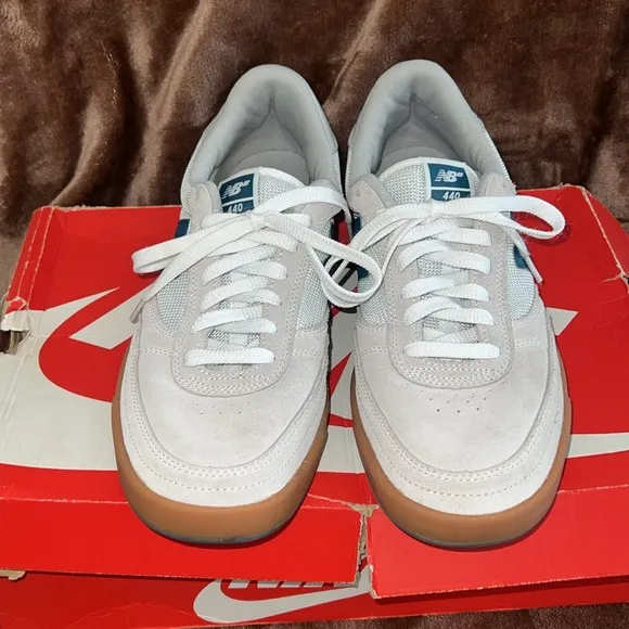 New Balance White and Blue Sneakers