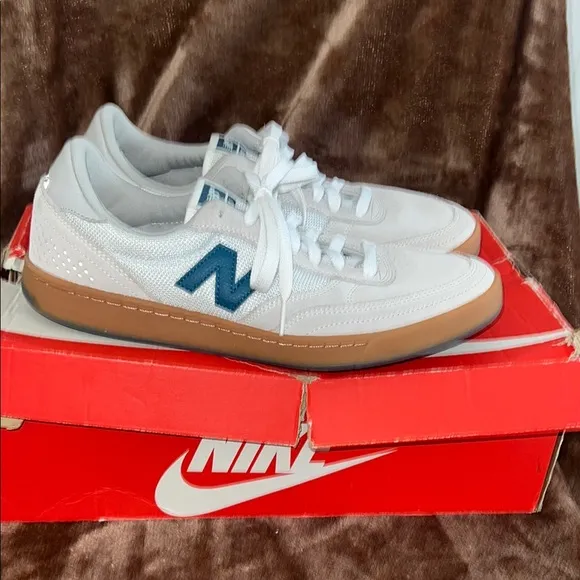 New Balance White and Blue Sneakers