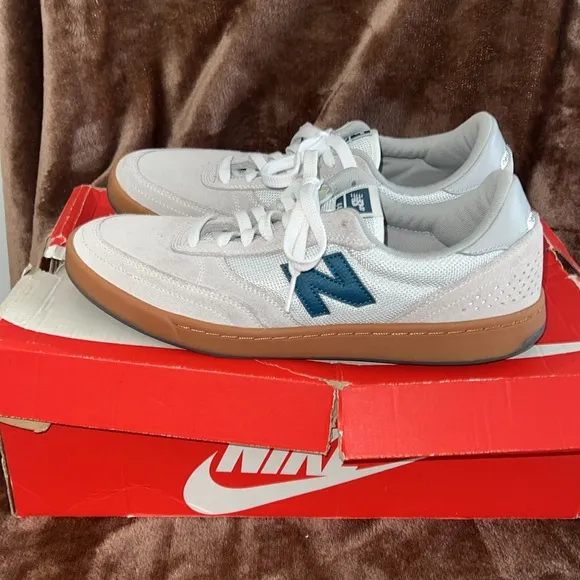 New Balance White and Blue Sneakers