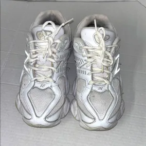 New Balance White Sneakers with Cushioned Sole and Mesh Upper