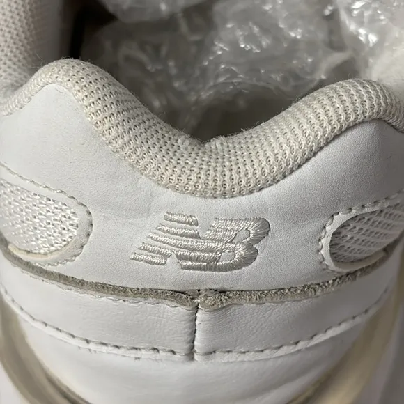 New Balance White Sneakers with Cushioned Sole and Mesh Upper