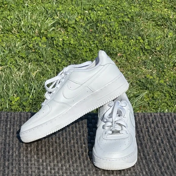Nike Air Force 1 White Sneakers with Textured Leather and Slim Profile