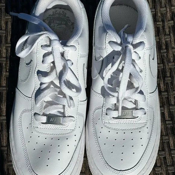 Nike Air Force 1 White Sneakers with Textured Leather and Slim Profile