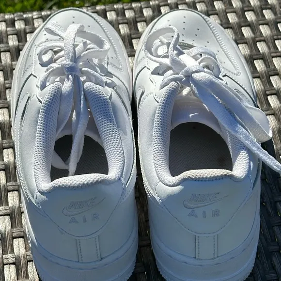 Nike Air Force 1 White Sneakers with Textured Leather and Slim Profile