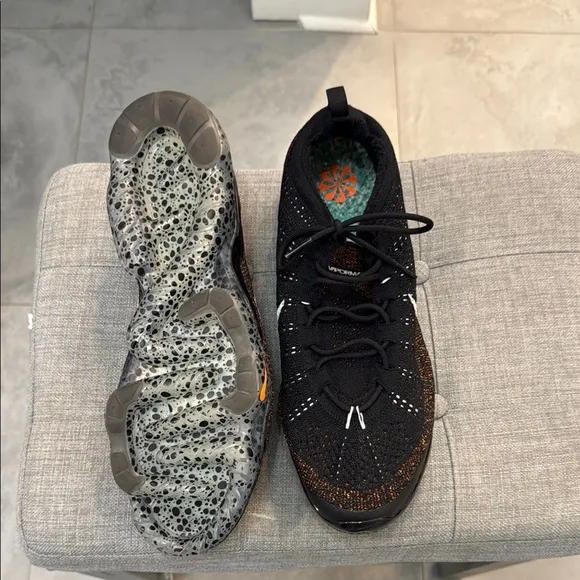 Nike Black and Orange Air VaporMax Flyknit Sneakers