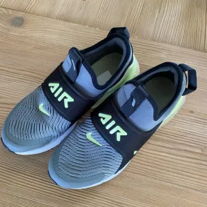 Nike Gray and Green Slip-On Sneakers with Cushioned Sole