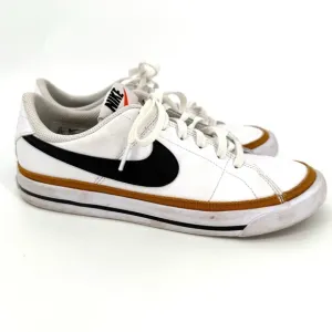 Nike White and Black Sneakers with Prominent Swoosh and Comfortable Midsole