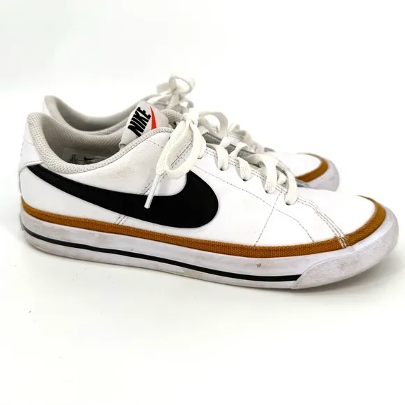 Nike White and Black Sneakers with Prominent Swoosh and Comfortable Midsole