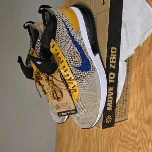 Nike Yellow and Blue Sneakers with Cushioned Sole