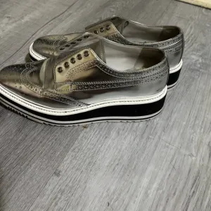 Prada Silver Sneakers with Platform Sole and Brogue Detailing