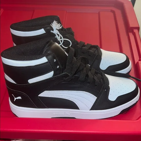 Puma Black and White Sneakers with Chunky Collar and Retro Style