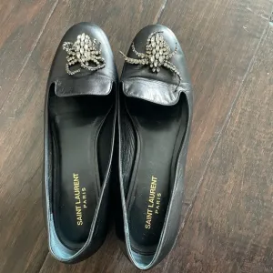 Saint Laurent leather flats with spider detail