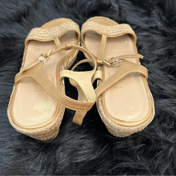 Stuart Weitzman “Flatty Old Gold Raffia” Sandals