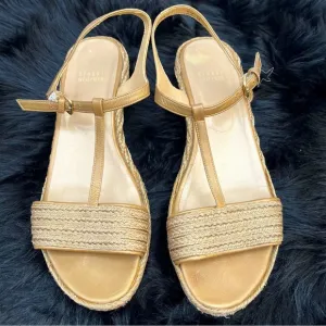 Stuart Weitzman “Flatty Old Gold Raffia” Sandals