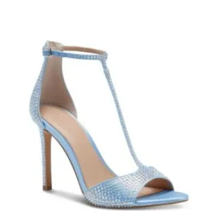 Subtle sparkle tops elegant T-straps and a gorgeous lift in the Firah sandals fr