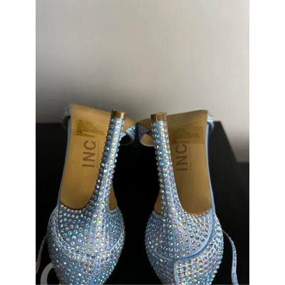 Subtle sparkle tops elegant T-straps and a gorgeous lift in the Firah sandals fr